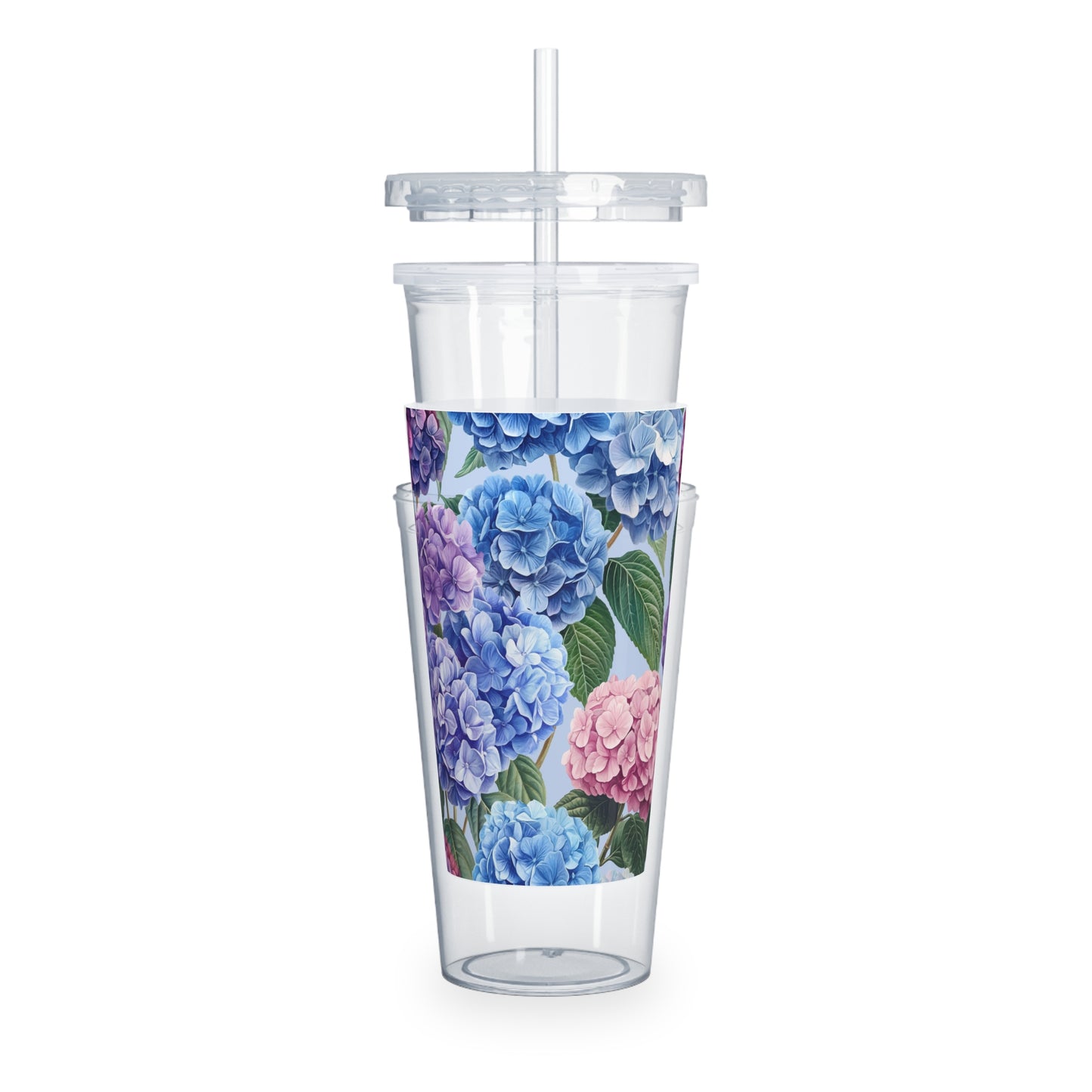 Clear tumbler with floral design on a white background