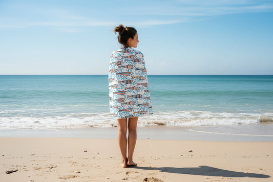 Towel with colorful fish pattern on a white background