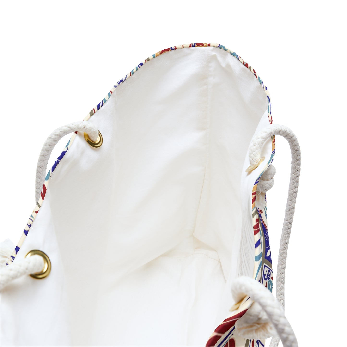 A Vibrant Portuguese tile pattern tote bag in blue, red, and yellow with rope handles.