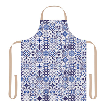 A kitchen apron with a blue and white Portuguese tile pattern, featuring beige neck and waist straps, displayed on a solid white background.