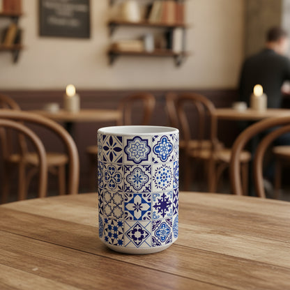 Ceramic mug with blue and white geometric pattern on a white background