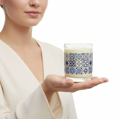 woman holding Candle with blue and white tile patterned 