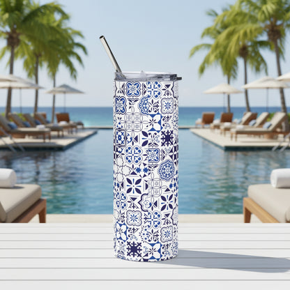 Tumbler with blue floral pattern on a white background