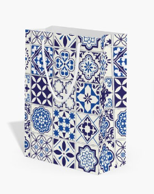 Notebook with blue and white tile pattern on a white background