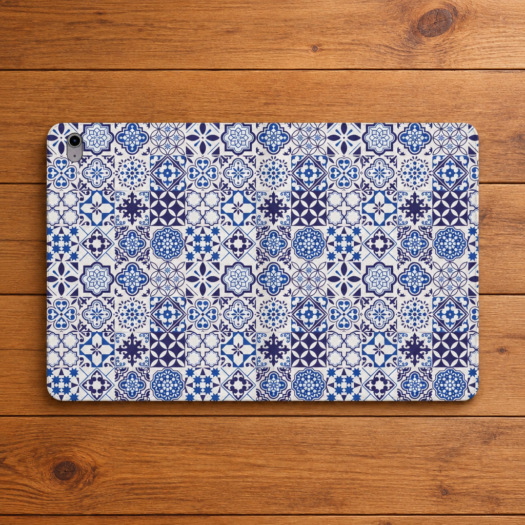 A protective case for an iPad, featuring a detailed blue and white Portuguese azulejo tile pattern, shown on a plain white background.