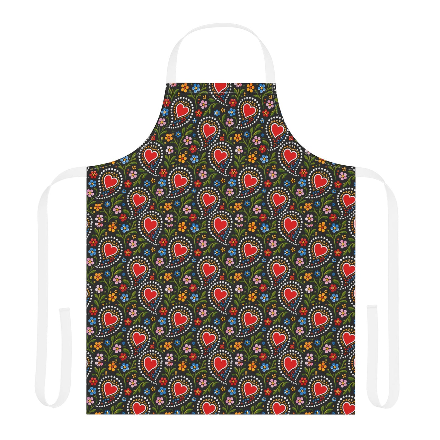 A white apron with a dark green front panel featuring a repeating pattern of red hearts, white dotted circles, and small colorful flowers, shown on a plain white background.