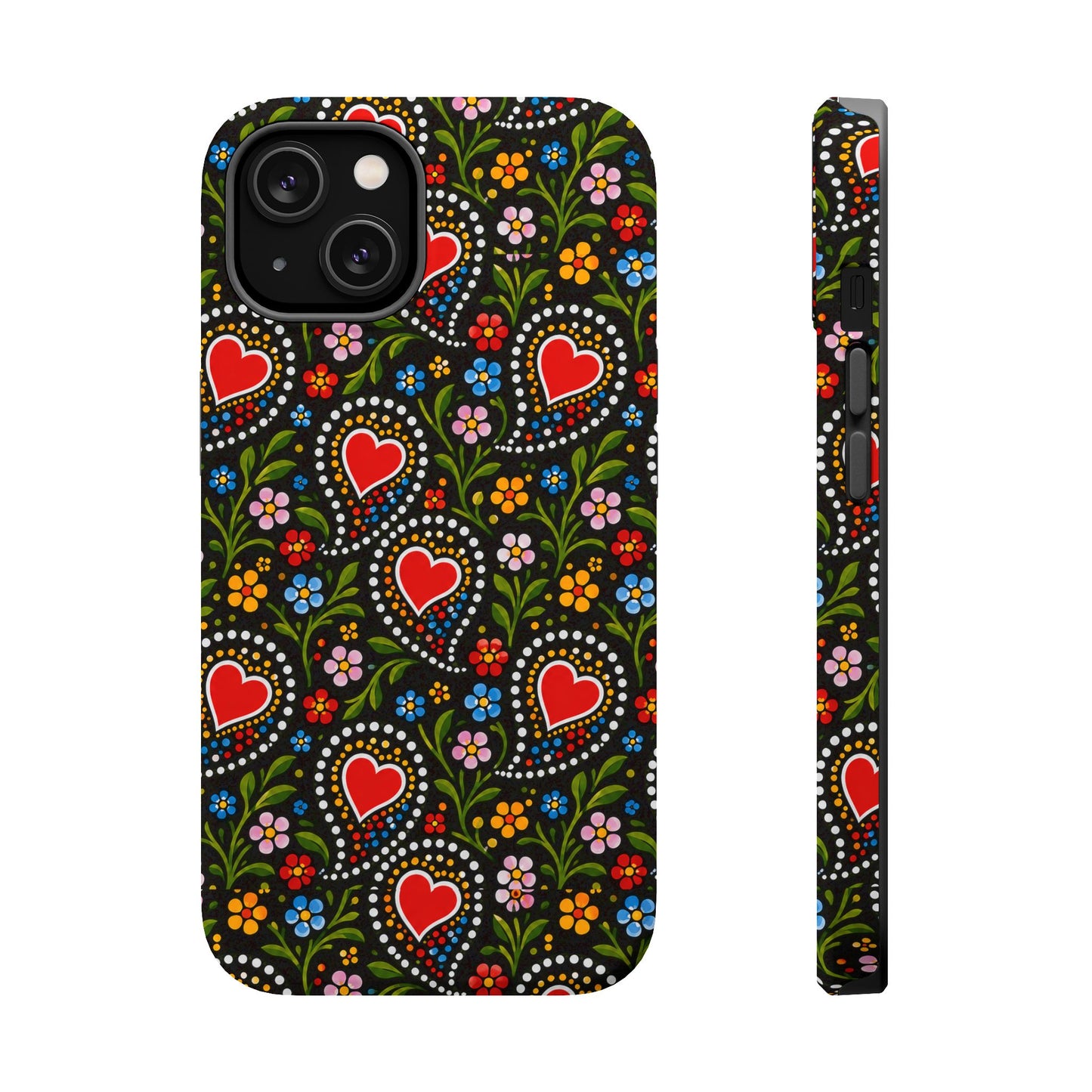 A phone case with a folk-art style pattern featuring red hearts, colorful flowers, and white dotted swirls on a black background, shown from the back and side on a white studio background.