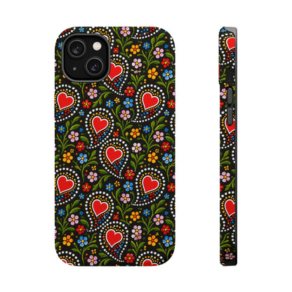 A phone case with a folk-art style pattern featuring red hearts, colorful flowers, and green leaves on a black background, shown from the back and side views.