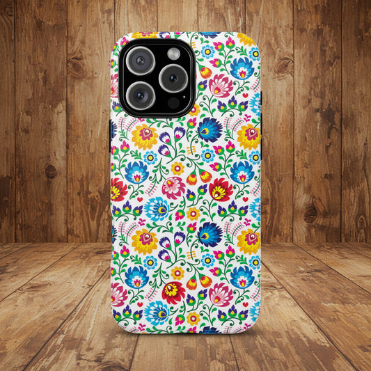 Phone case with colorful floral pattern on a wood background