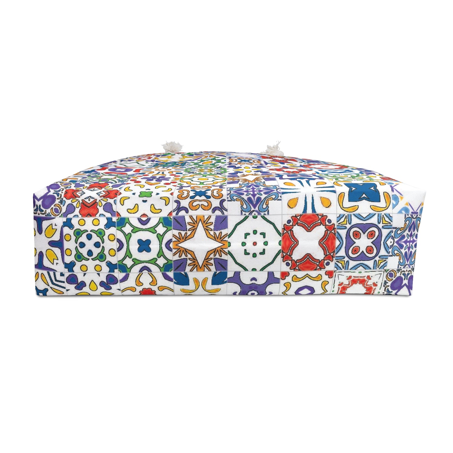Colorful patterned ottoman on a white background