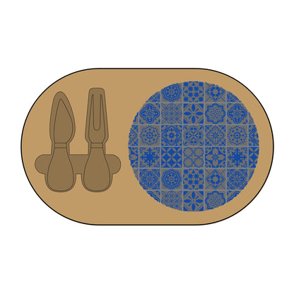Brown oval charcuterie board with engraved geometric pattern and two brown spoons on a white background