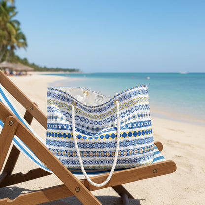 Tote bag with blue and white pattern on a beach chair