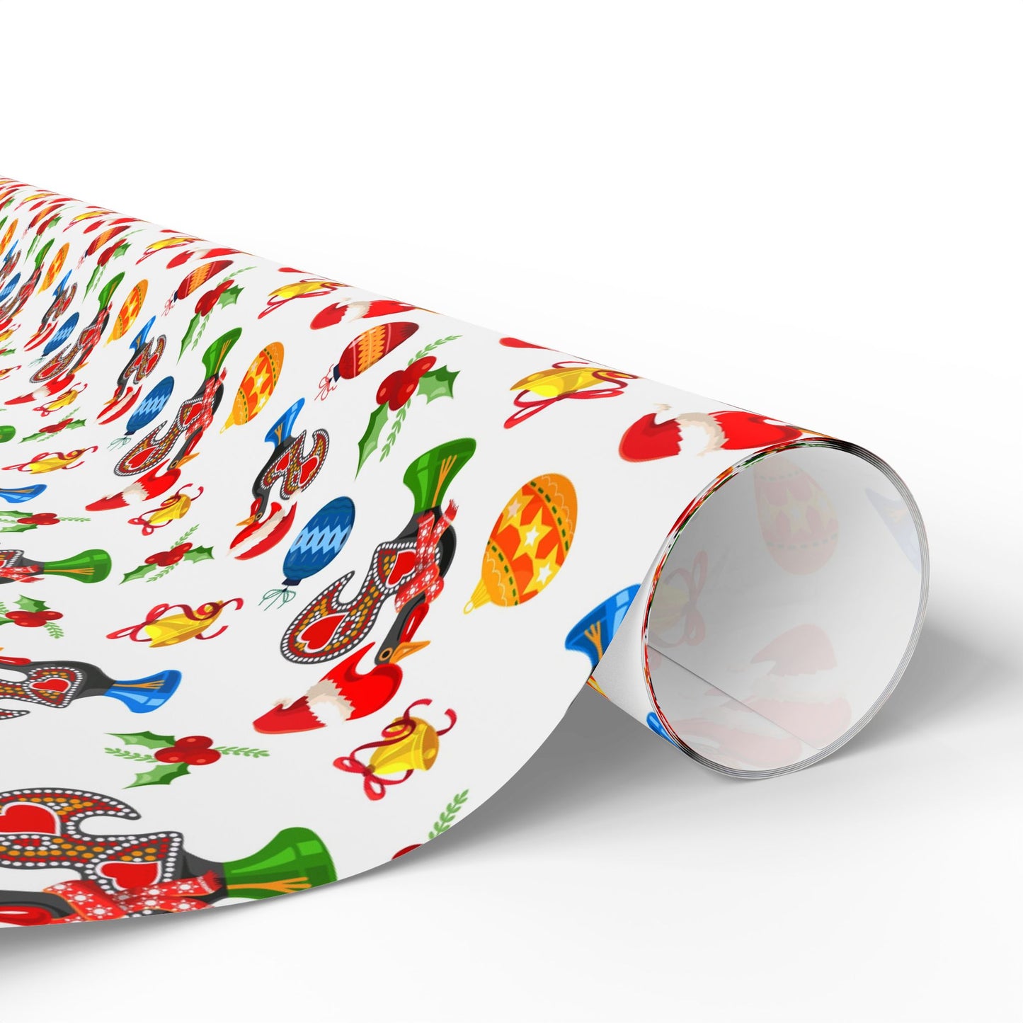 Roll of colorful wrapping paper with galo de barcelos christmas theme on a white background