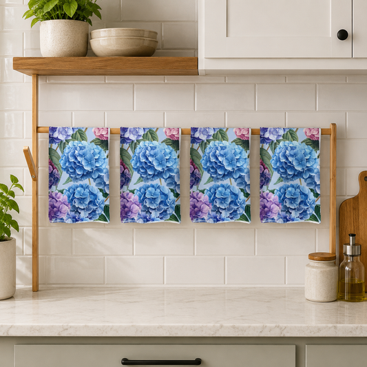 Floral towels hanging on a rack in a kitchen