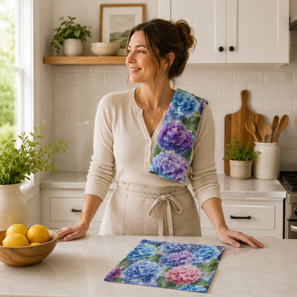 Woman in a kitchen with floral towels on a table
