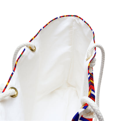 White drawstring bag with colorful strings on a white background