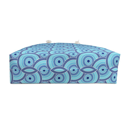 Blue and white patterned bag on a white background