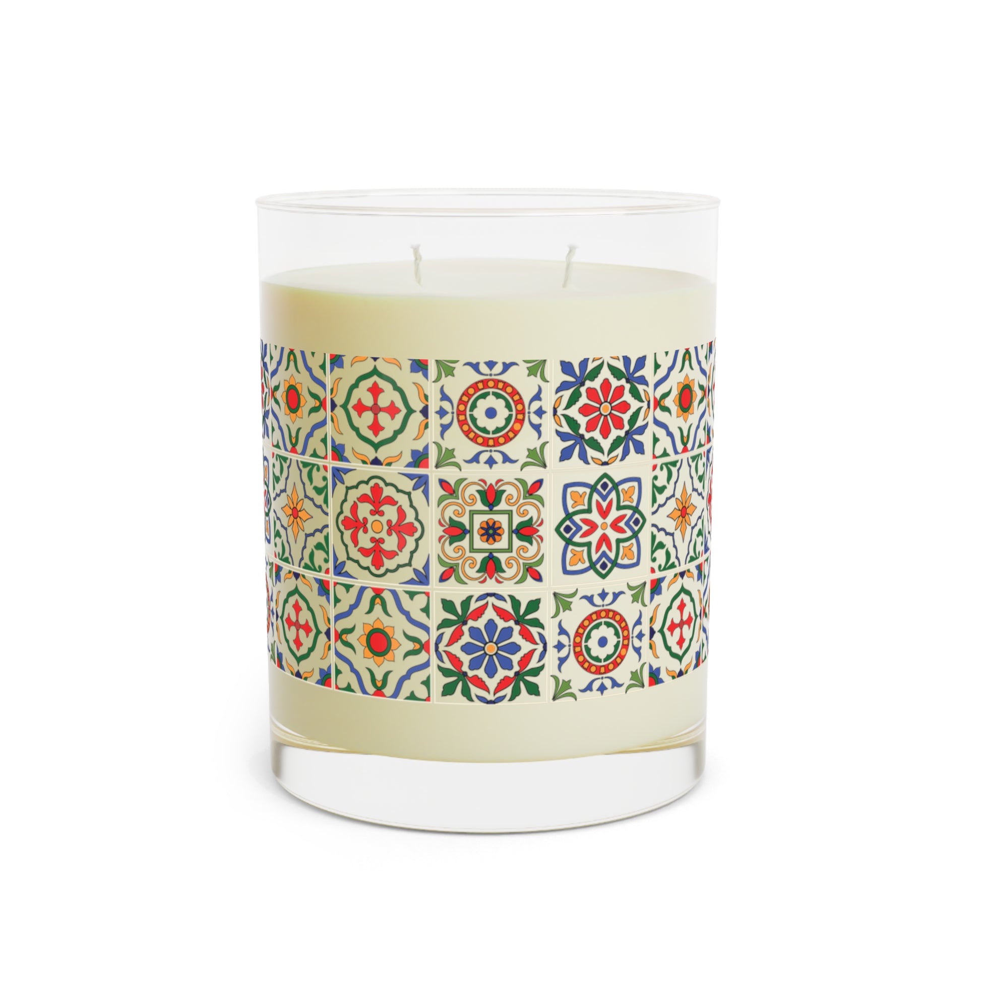 Candle with colorful tile patterned label on a white background