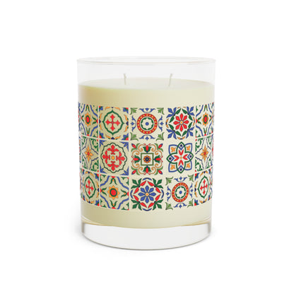 Candle with colorful tile patterned label on a white background