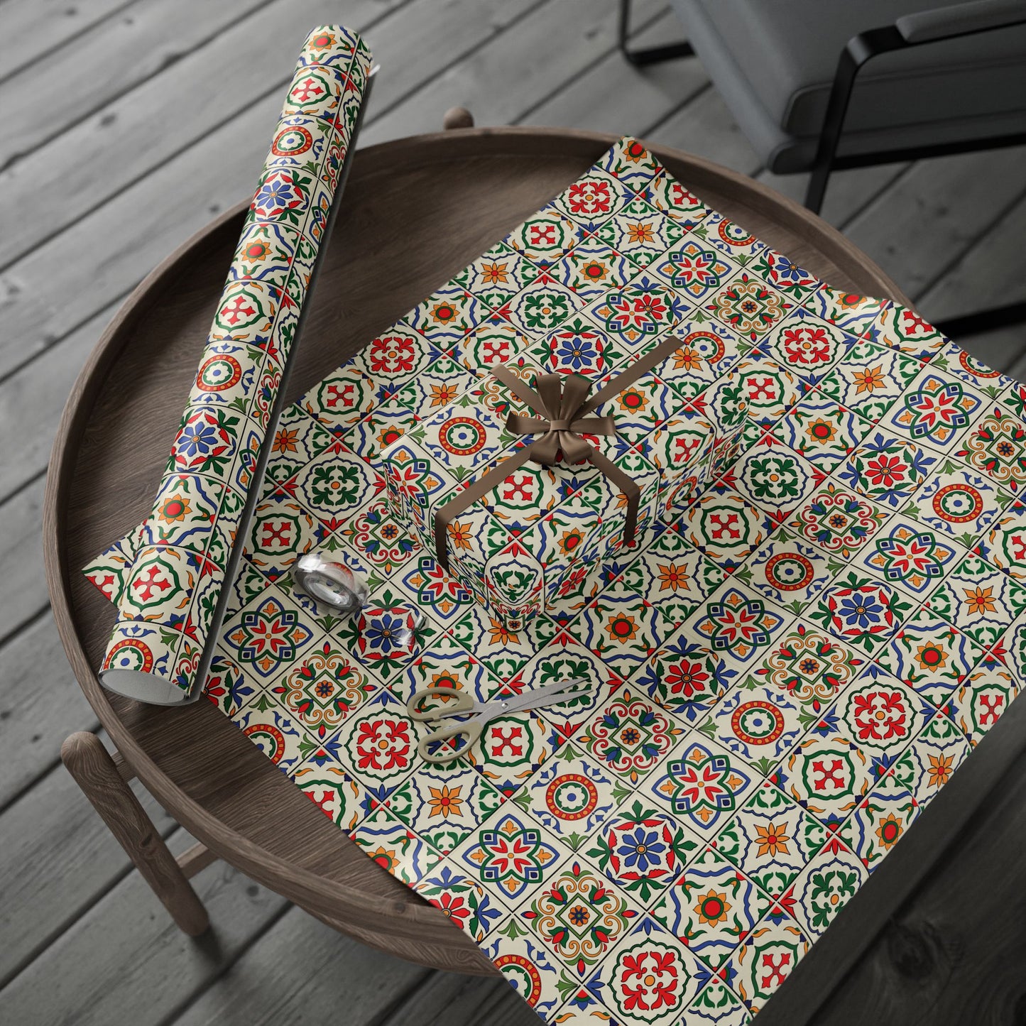 Decorative wrapping paper with colorful  portuguese tile pattern on a wooden table