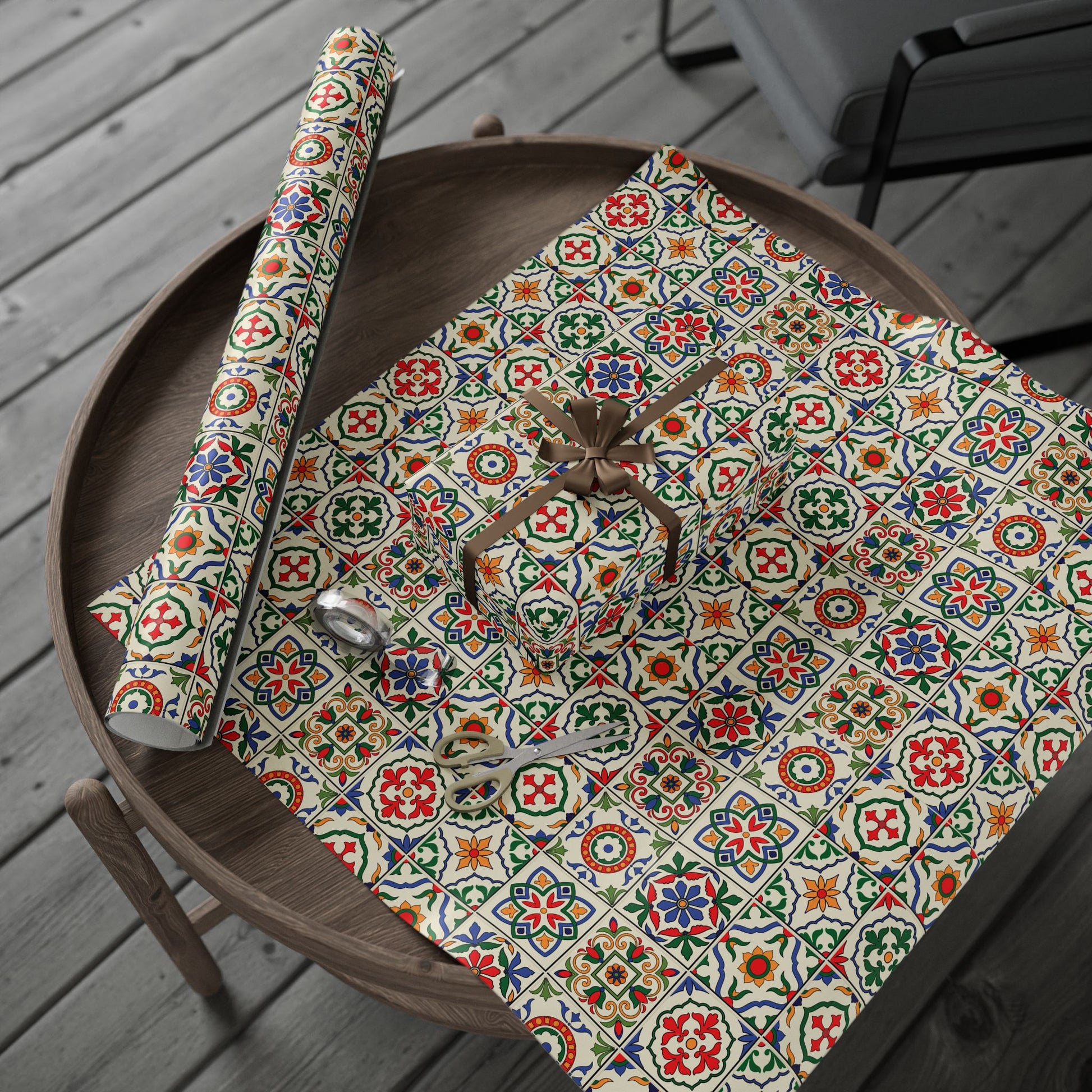 Decorative wrapping paper with colorful  portuguese tile pattern on a wooden table