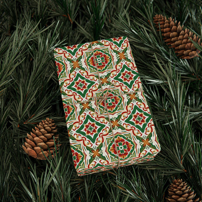 Gift box with a colorful portuguese christmas tile pattern on a bed of pine needles and pine cones