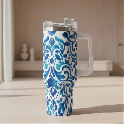 Blue and white patterned mug on a wooden table with a modern room in the background