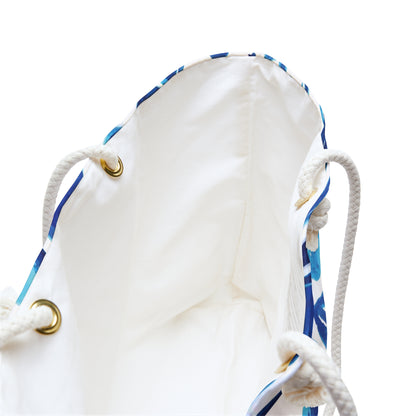 White drawstring bag with blue accents on a white background