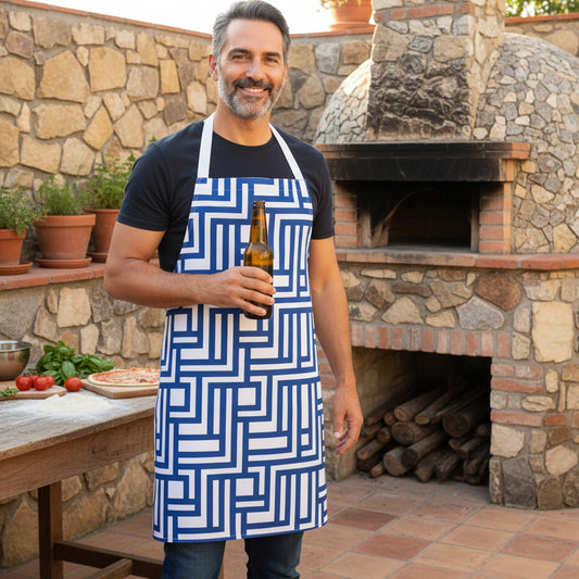 Man wearing a blue geometric patterned apron on a white background