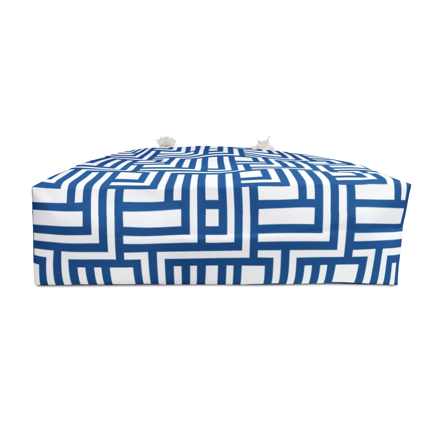Blue and white geometric patterned bag bottom on a white background