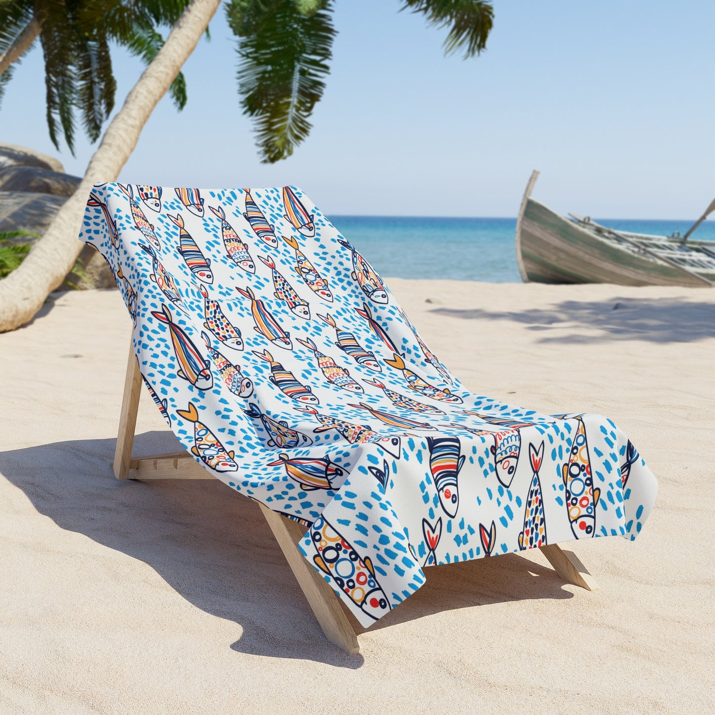 Colorful towel draped over a beach chair on a sandy beach with palm trees and ocean in the background.