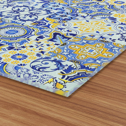 Decorative tablecloth with blue and yellow pattern on a white background