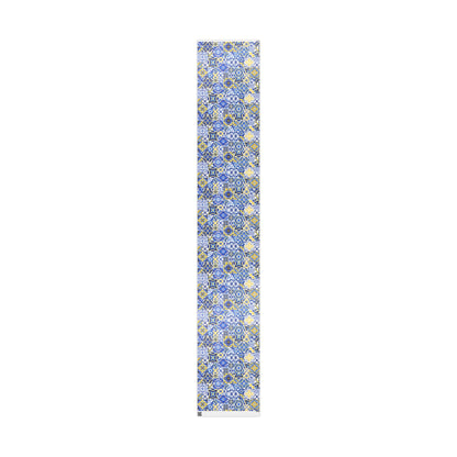 sheet of wrapping paper with blue and yellow portuguese tile pattern on a white background