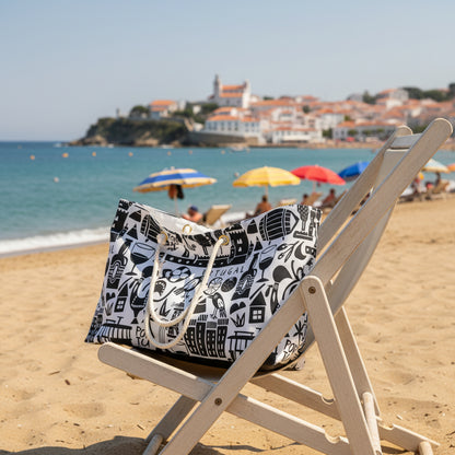 White tote bag with black portugal  pattern on a beach chair