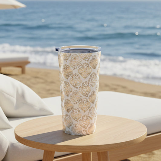 Tumbler with heart pattern on a white background