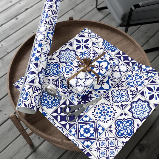 blue and white tile pattern giftwrap on a wooden table