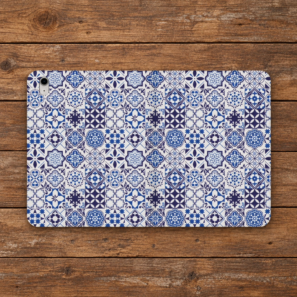 A protective tablet case featuring a detailed blue and white Moroccan tile pattern, shown from a top-down view on a plain white background.