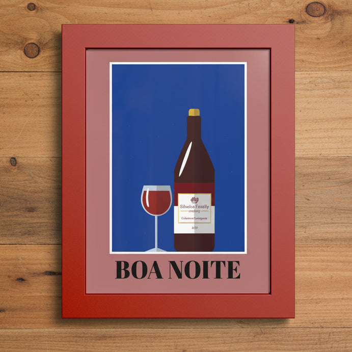 Framed wall art featuring a stylized wine bottle and wine glass on a blue background with the text 'BOA NOITE' in black, set in a reddish-brown frame against a white background.