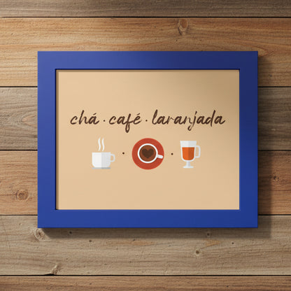 A square framed art print with a royal blue frame and a beige background, featuring the Spanish text 'chá ¿café ¿laranja da' above simple illustrations of a white coffee cup, a red coffee cup with espresso, and a glass of orange drink.