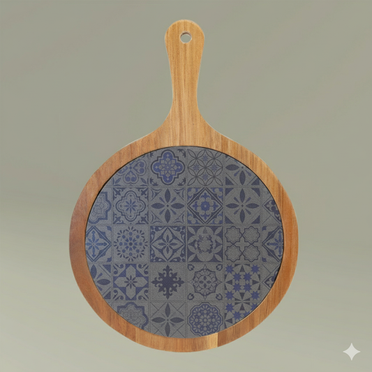 Wooden serving board with a decorative engraved tile pattern on a gray background